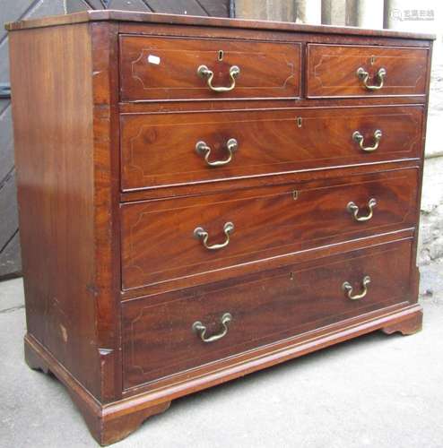 A Georgian mahogany bedroom chest of two short over three lo...