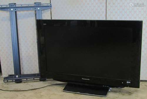 A Panasonic LCD television model number TX=32LZD81, freestan...