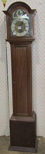 A mahogany Grandmother clock, the hood enclosing a broken ar...