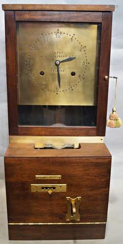 An Autok Time Recorders Ltd works clock in a later mahogany ...