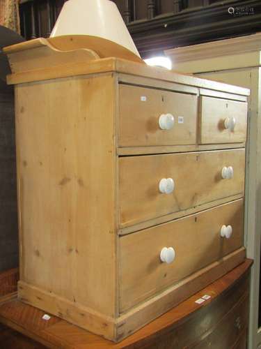 A Victorian stripped pine bedroom chest of two long and two ...