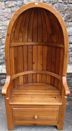 A stripped pine barrel back chair with arched canopy, scroll...