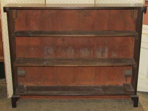 A narrow freestanding mahogany open bookcase with reeded out...