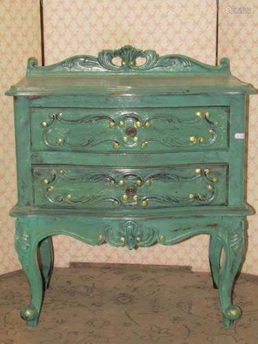 A low two drawer chest with serpentine front with applied C ...