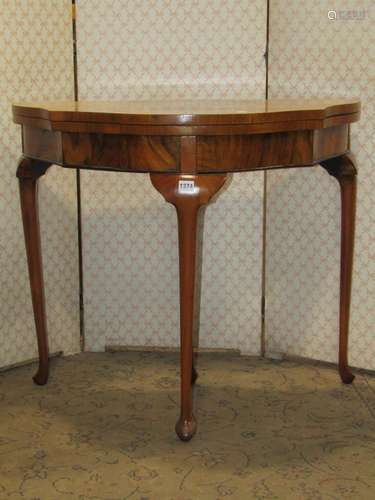 A Queen Ann style walnut figured and burr walnut veneered de...