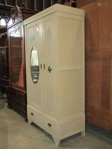 A 1930s continental wardrobe with applied and reeded detail,...