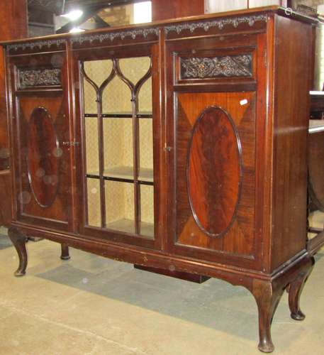 An Edwardian mahogany side cabinet freestanding and enclosed...