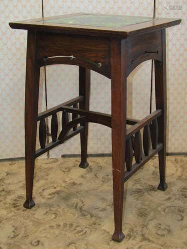 An arts and crafts oak occasional table the over hanging squ...