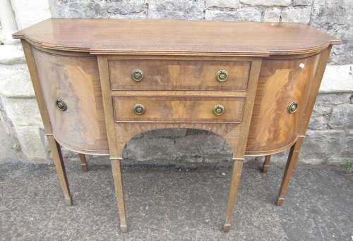 A small Georgian style mahogany shallow breakfront sideboard...