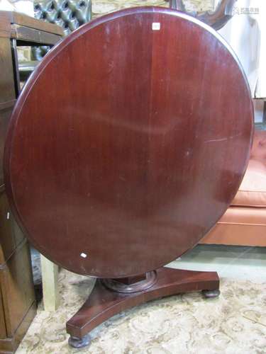 Victorian mahogany tea table with circular top raised on a t...