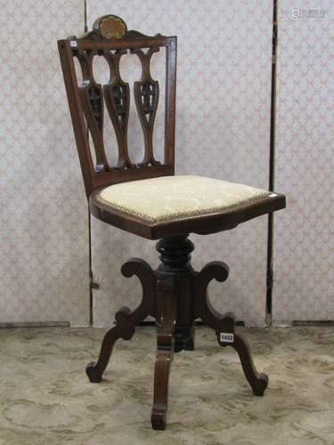 An inlaid Edwardian mahogany music chair with rise and fall ...