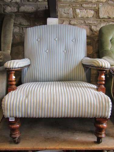 A Victorian drawing room chair with repeating stripped patte...