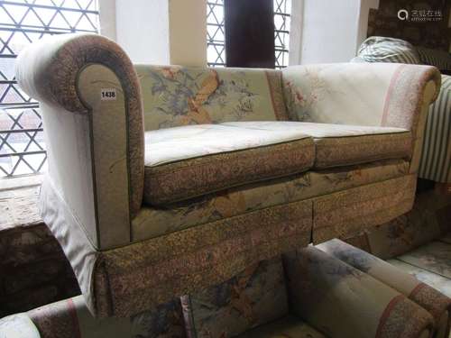 A suite of traditional lounge furnishings comprising a pair ...