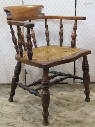 A 19th century smokers bow or captains type chair with turne...