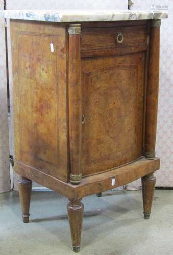 A burr and figured walnut veneered bedside cabinet with serp...