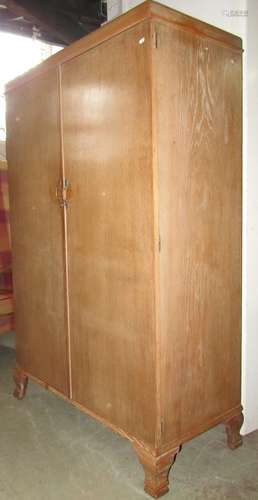 A limed/fumed oak compactum wardrobe "x. c. h. model&qu...