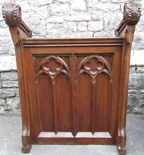 A Victorian ecclesiastical lectern in pitched and oak with g...