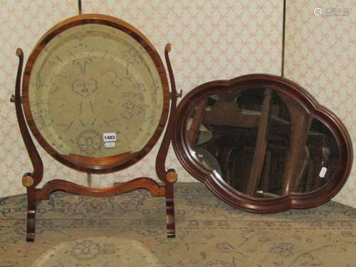 An Edwardian toilet mirror of oval form together with a Vict...