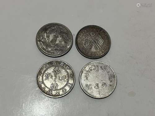 Four Chinese Coins