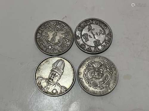 Four Chinese Coins