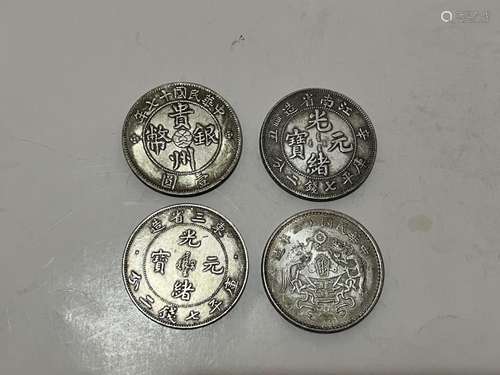 Four Chinese Coins