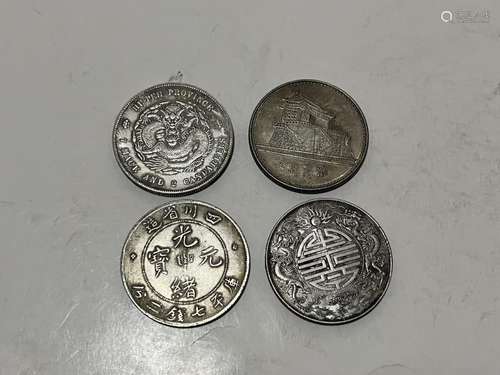 Four Chinese Coins