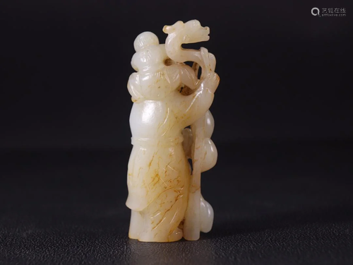 A Carved Riverbed Jade 'Longevity' Deity Statue