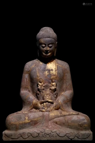 A Gold Paste Carved Stone Seated Buddha Statue