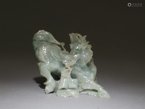 A Carved Jade Figurine