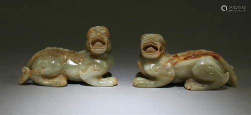 A Pair of Carved Jade Qilin Figurines