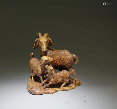 A Carved Stone Goat Figurine