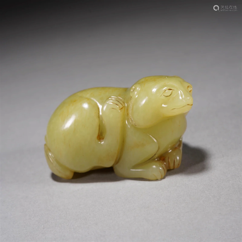 Carved yellow jade 'BEAST' paper weight