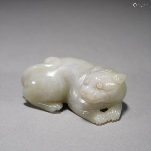 Carved white jade 'LUCKY' beast ornament