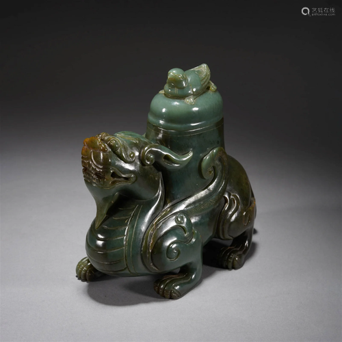 Carved green jade 'BEAST' ornament