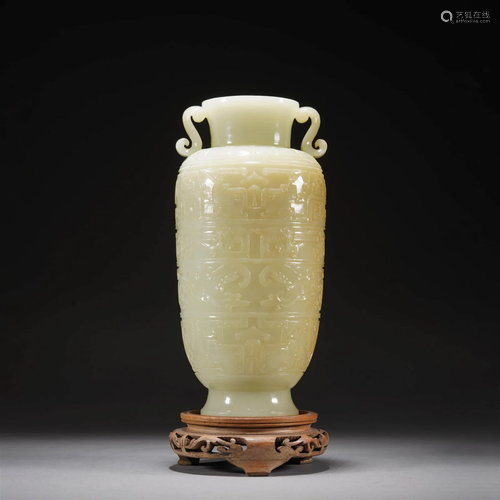 Carved white jade vase