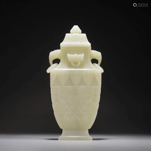 Carved white jade beast pattern vase, Qing Dynasty