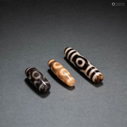 THREE DZI BEADS