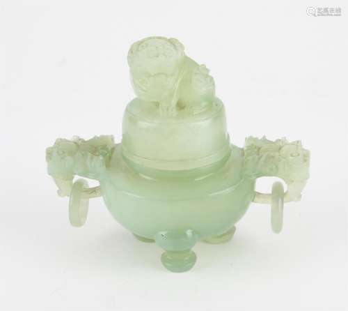 A Chinese Xiu Jade Tripod censer. Decorated with Foo dog fin...