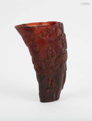 A Chinese Buffalo Libation Cup. Intricately carved in a reli...