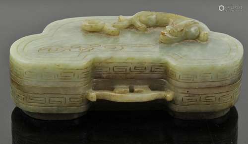 Chinese Ruyi shaped jade box. The cover carved with a beast ...