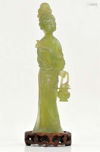 A Jade Sculpture of a Lady , Republic period. The standing l...