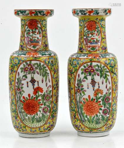 A pair of Chinese yellow ground Famille Rose vases, 19/20th ...