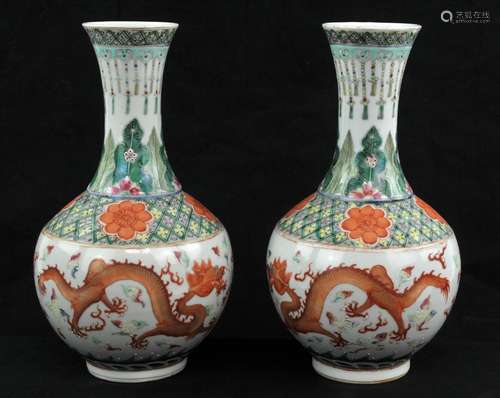 A pair of Chinese Famille Verte, Iron red, Dragon Bottle vas...