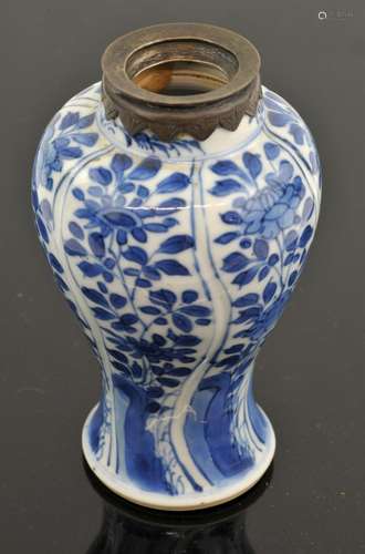 A Chinese blue and white miniature vase with metal mount. Qi...