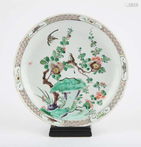 A Chinese famille verte charger Qing dynasty painted with a ...