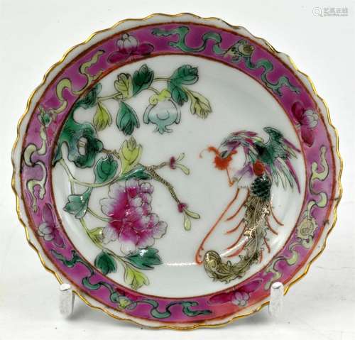 A Chinese Famille Rose Phoenix Saucer, 19th century. This ty...