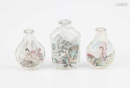 Three inside painted glass snuff bottles. 20th century. Two ...