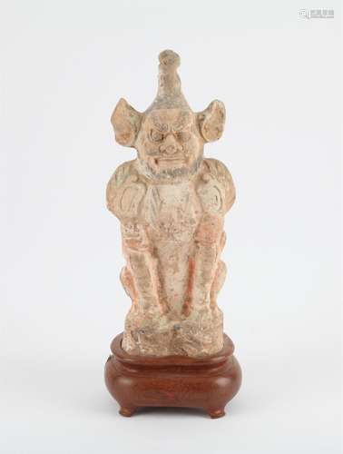 A Chinese painted buff pottery figure of an Earth Spirit, Ta...