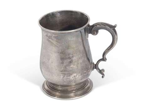 Late George II one pint baluster tankard with leaf capped do...