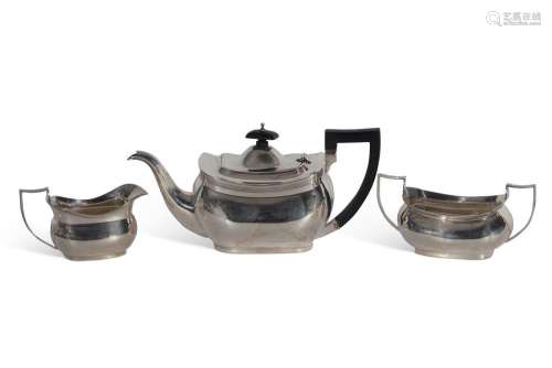 Three-piece tea set of slightly compressed oval form with re...